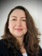 Ein Portrait einer Frau im Anzug